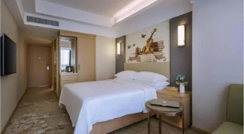 Bed in Vienna Hotel Zhengzhou East High-Speed Railway Station