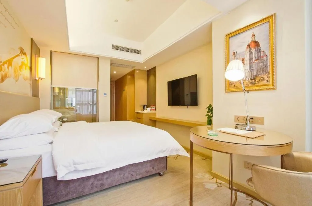 Bed in Vienna Hotel Zhengzhou East High-Speed Railway Station