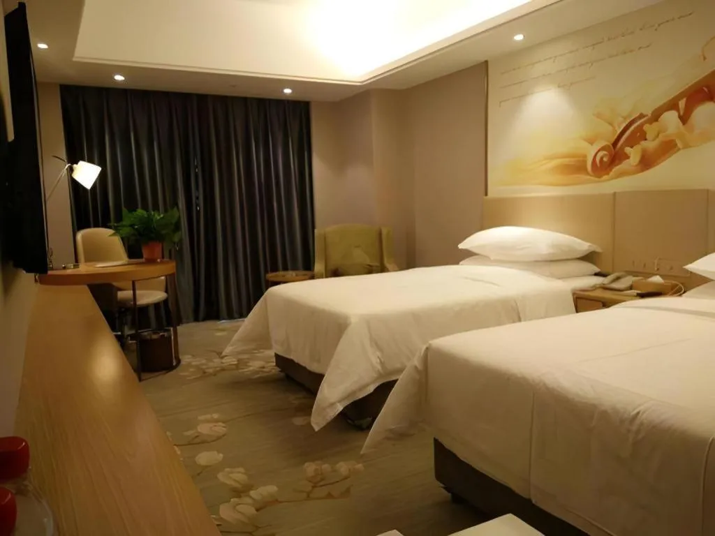 Bed in Vienna Hotel Zhengzhou East High-Speed Railway Station