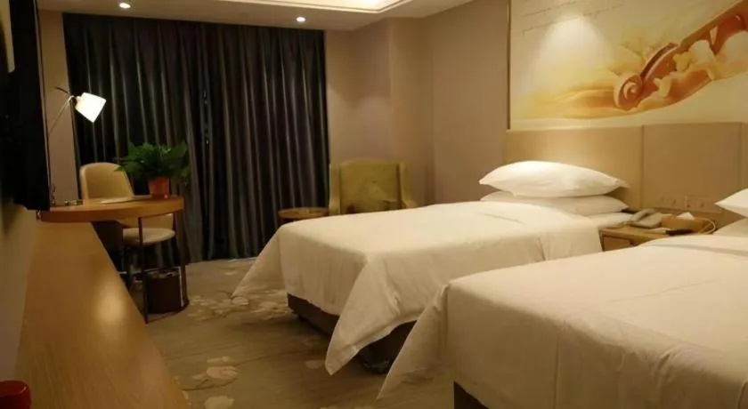 Bed in Vienna Hotel Zhengzhou East High-Speed Railway Station
