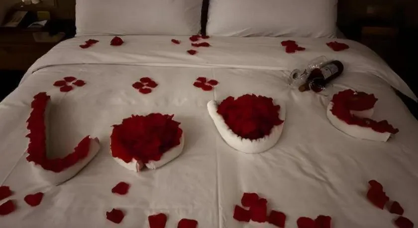 Bed in Vienna Hotel Zhengzhou East High-Speed Railway Station