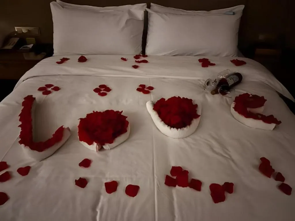 Bed in Vienna Hotel Zhengzhou East High-Speed Railway Station