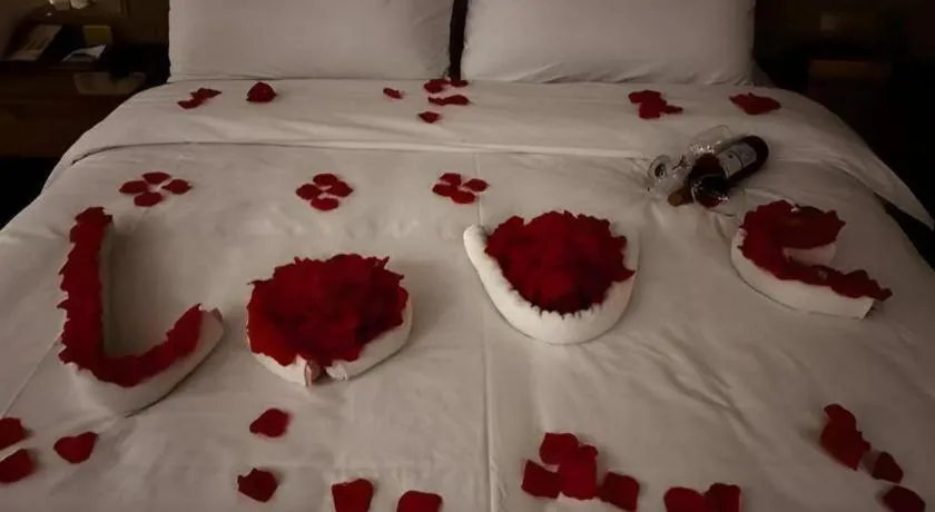 Bed in Vienna Hotel Zhengzhou East High-Speed Railway Station