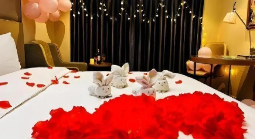 Bed in Vienna Hotel Zhengzhou East High-Speed Railway Station