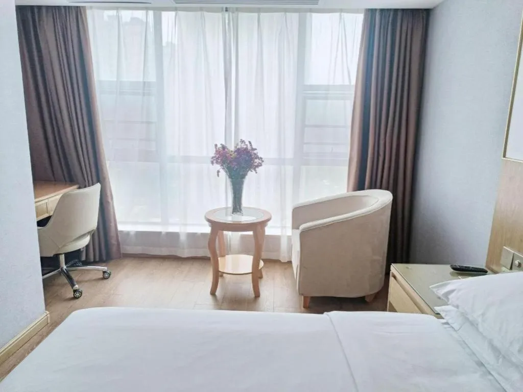 Bed in Vienna Hotel Yueyang East Station