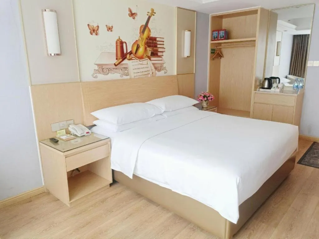 Bed in Vienna Hotel Yueyang East Station