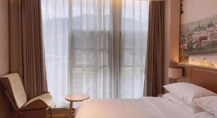 Bed in Vienna Hotel Chongqing West Station Square