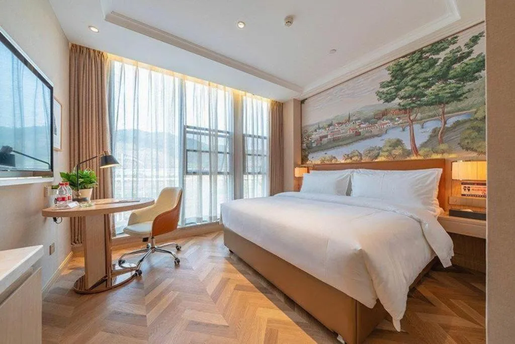 Bed in Vienna Hotel Chongqing West Station Square