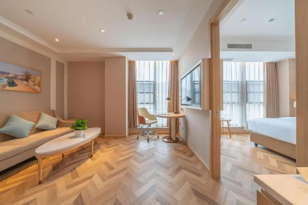 Bed in Vienna Hotel Chongqing West Station Square