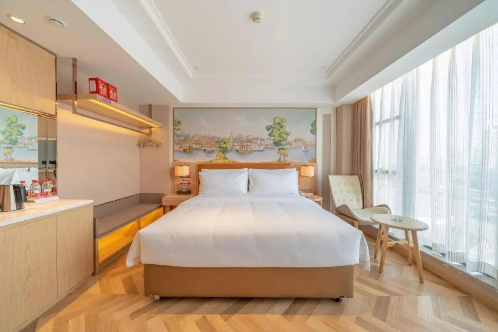 Bed in Vienna Hotel Chongqing West Station Square