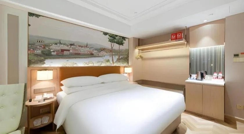 Bed in Vienna Hotel Chongqing West Station Square