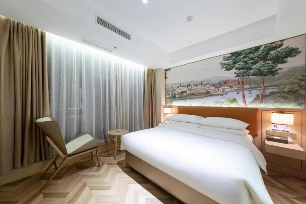 Bed in Vienna Hotel Chongqing West Station Square