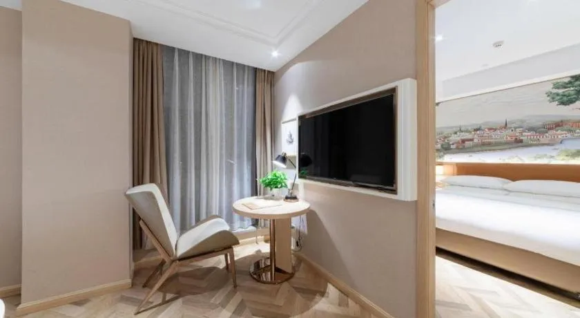 Bed in Vienna Hotel Chongqing West Station Square