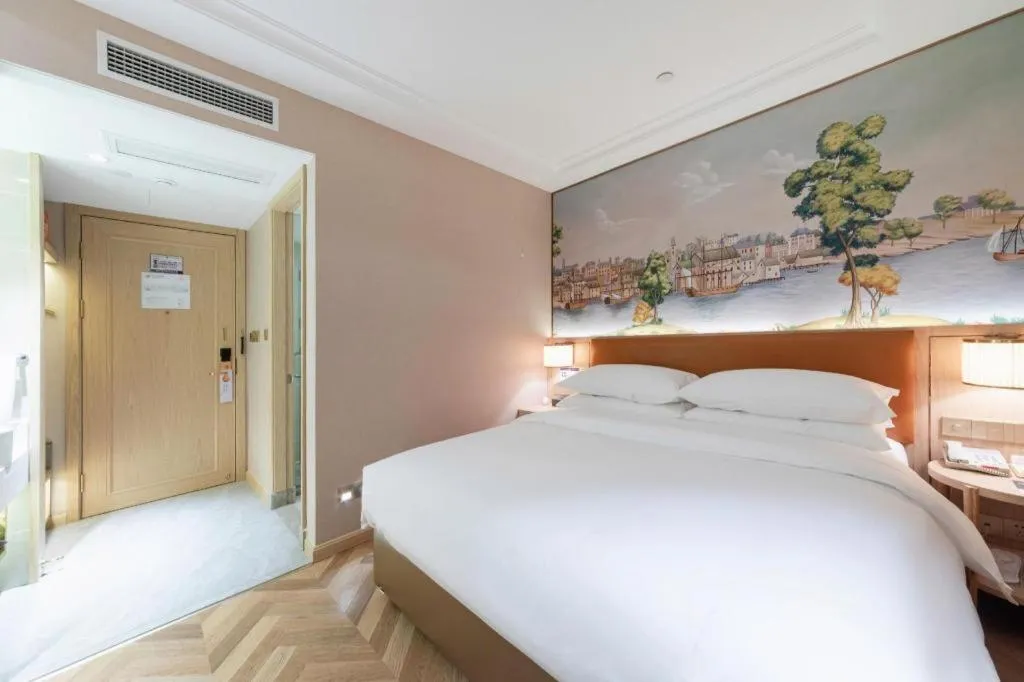 Bed in Vienna Hotel Chongqing West Station Square