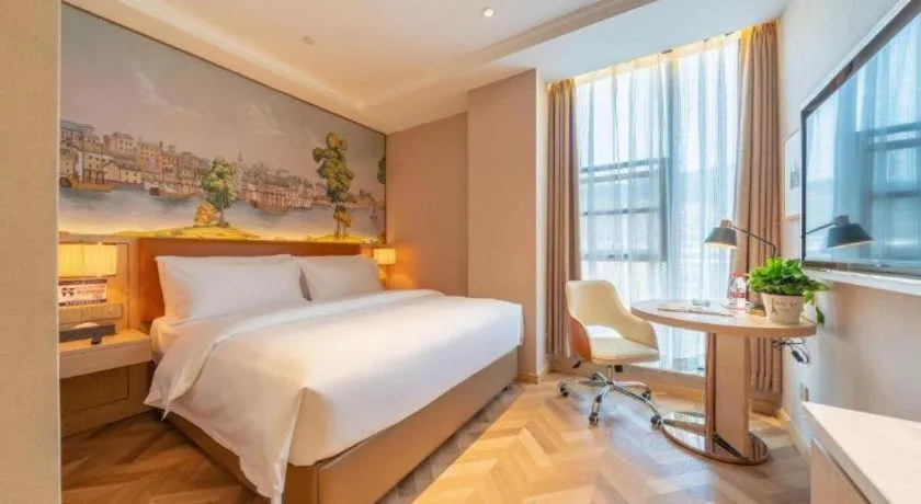 Bed in Vienna Hotel Chongqing West Station Square