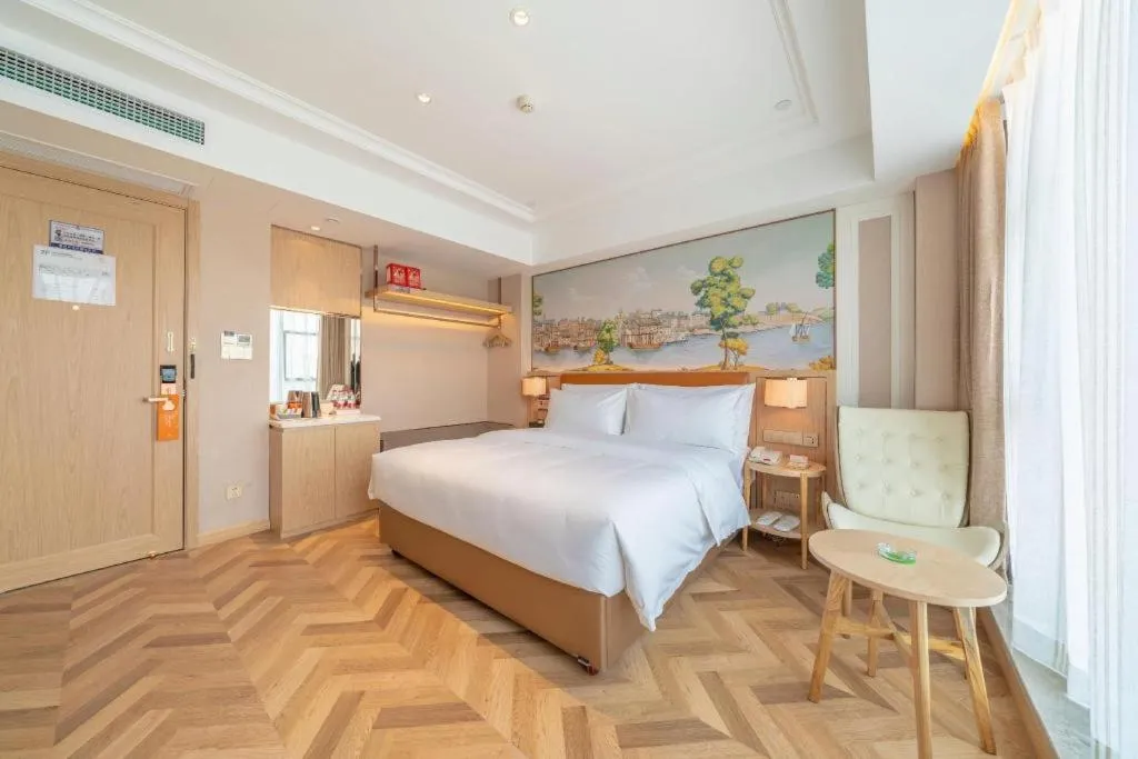 Bed in Vienna Hotel Chongqing West Station Square