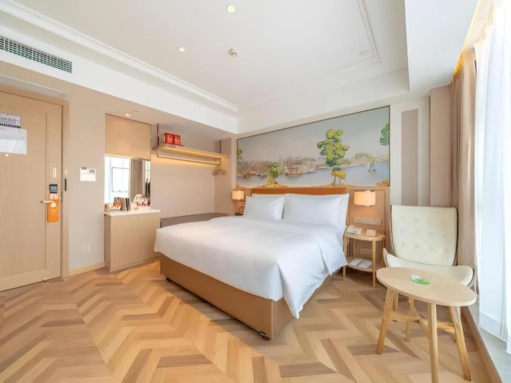 Bed in Vienna Hotel Chongqing West Station Square