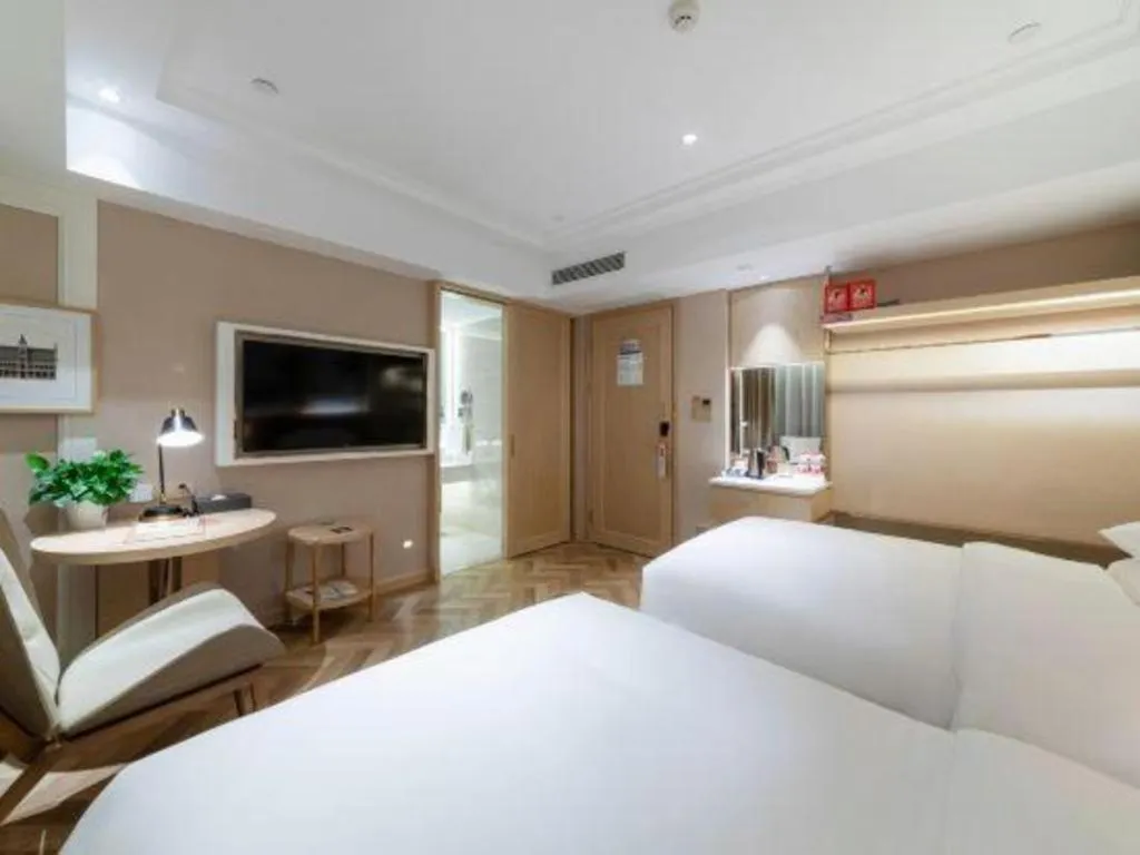 Bed in Vienna Hotel Chongqing West Station Square