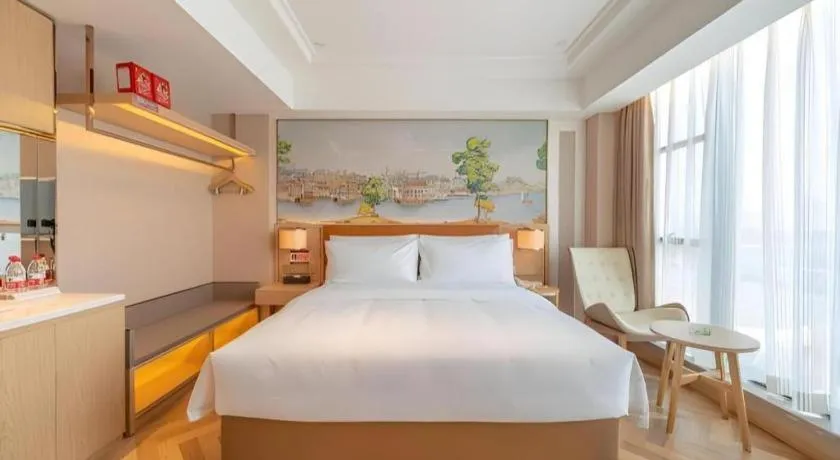 Bed in Vienna Hotel Chongqing West Station Square