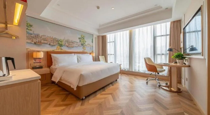 Bed in Vienna Hotel Chongqing West Station Square