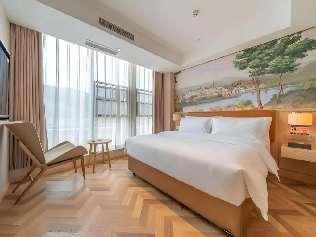 Bed in Vienna Hotel Chongqing West Station Square