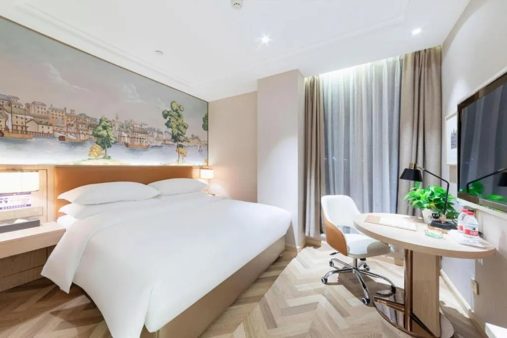 Bed in Vienna Hotel Chongqing West Station Square