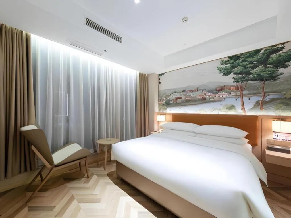 Bed in Vienna Hotel Chongqing West Station Square