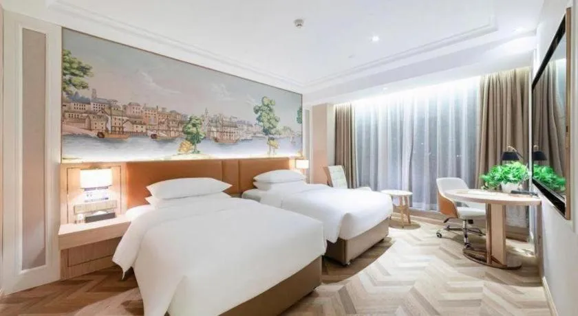 Bed in Vienna Hotel Chongqing West Station Square