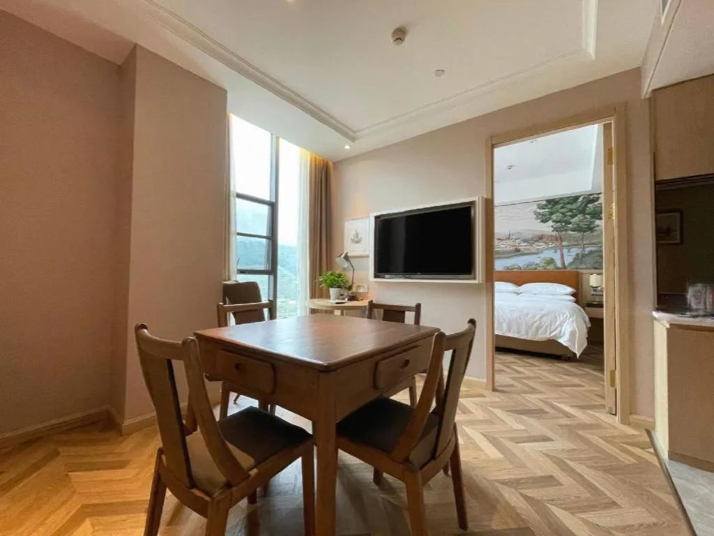 Bed in Vienna Hotel Chongqing West Station Square