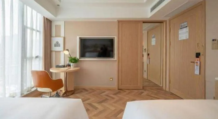 Bed in Vienna Hotel Chongqing West Station Square