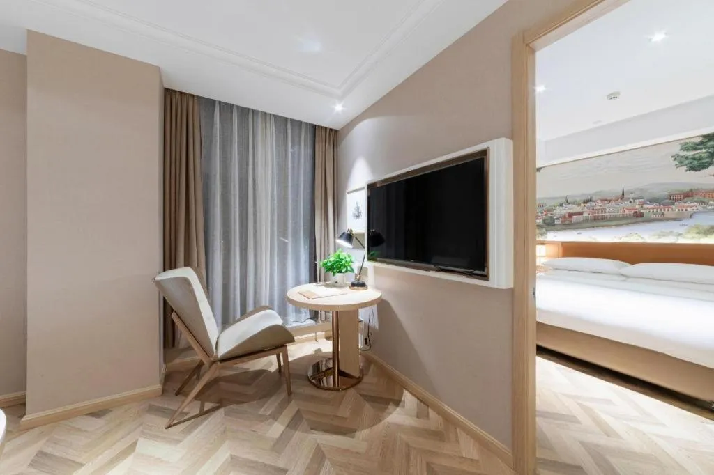 Bed in Vienna Hotel Chongqing West Station Square