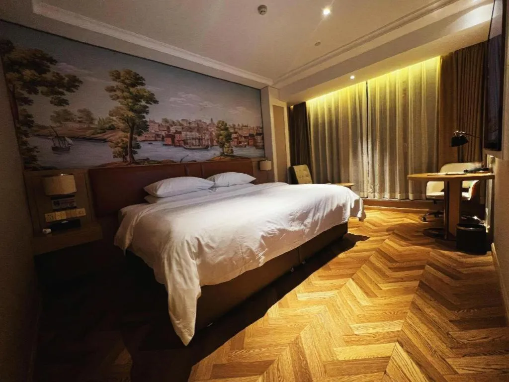 Bed in Vienna Hotel Chongqing West Station Square