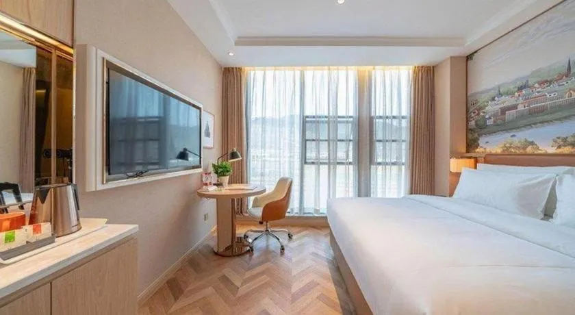 Bed in Vienna Hotel Chongqing West Station Square