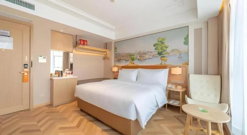 Bed in Vienna Hotel Chongqing West Station Square