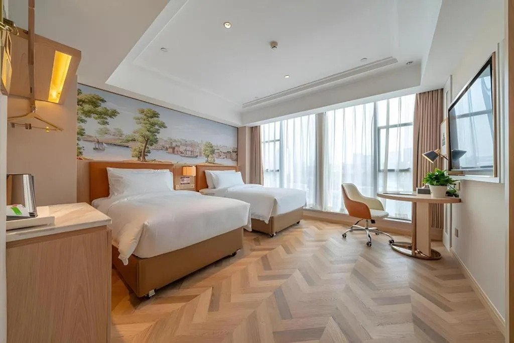 Bed in Vienna Hotel Chongqing West Station Square