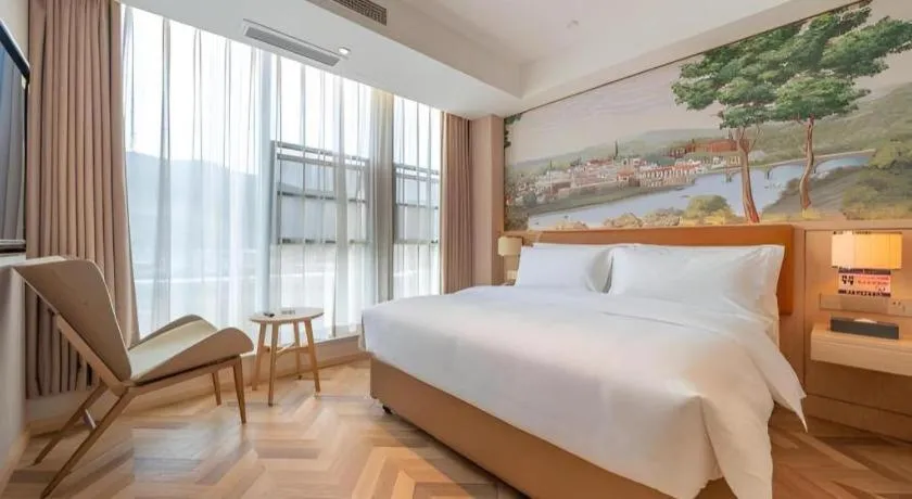 Bed in Vienna Hotel Chongqing West Station Square