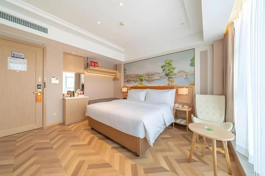 Bed in Vienna Hotel Chongqing West Station Square