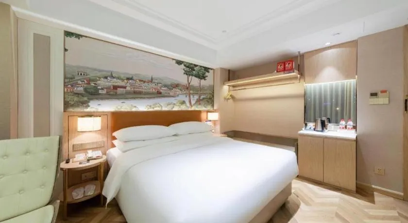 Bed in Vienna Hotel Chongqing West Station Square