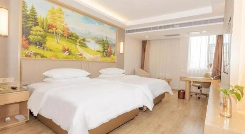 Bed in Vienna Hotel Yuxi Hongta Avenue High-Speed Railway Station