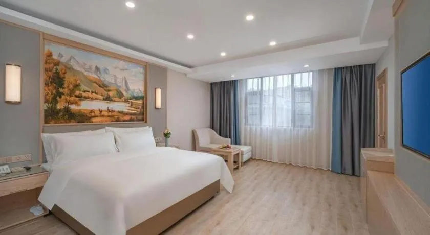 Bed in Vienna Hotel Yuxi Hongta Avenue High-Speed Railway Station