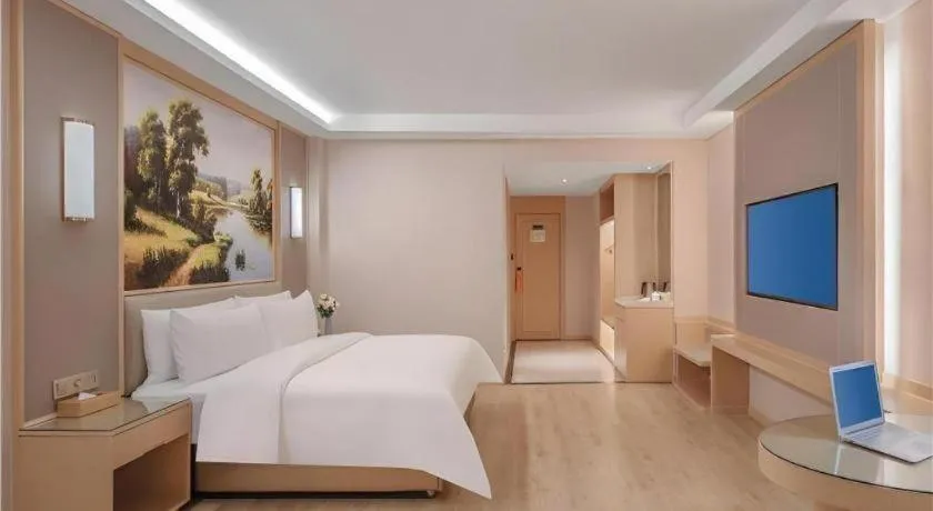 Bed in Vienna Hotel Yuxi Hongta Avenue High-Speed Railway Station