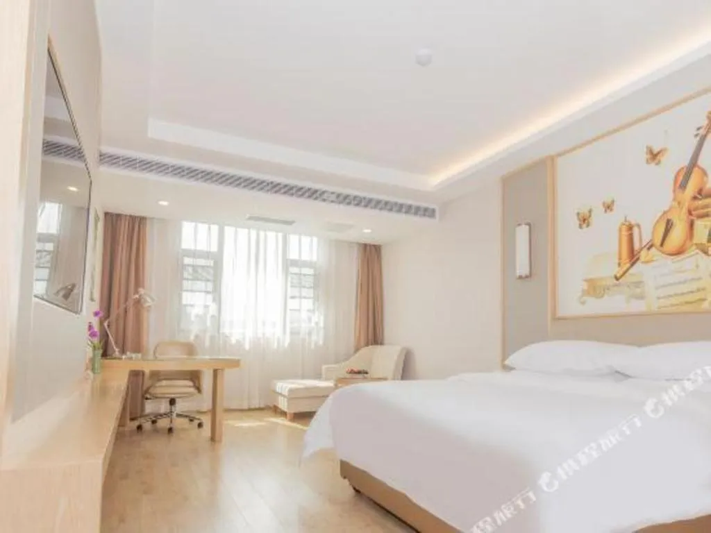 Bed in Vienna Hotel Yuxi Hongta Avenue High-Speed Railway Station