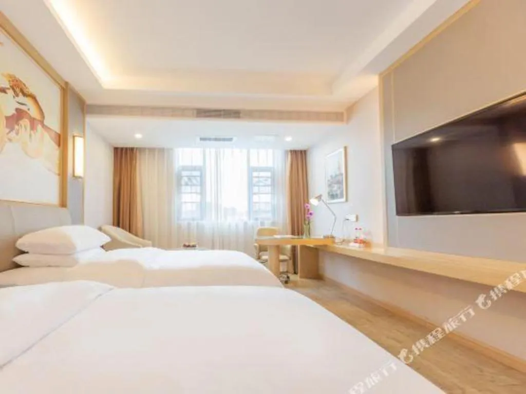 Bed in Vienna Hotel Yuxi Hongta Avenue High-Speed Railway Station