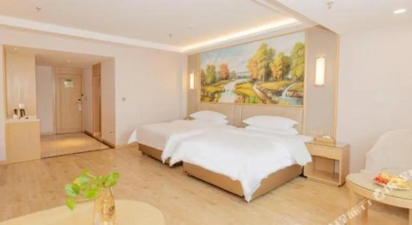 Bed in Vienna Hotel Yuxi Hongta Avenue High-Speed Railway Station