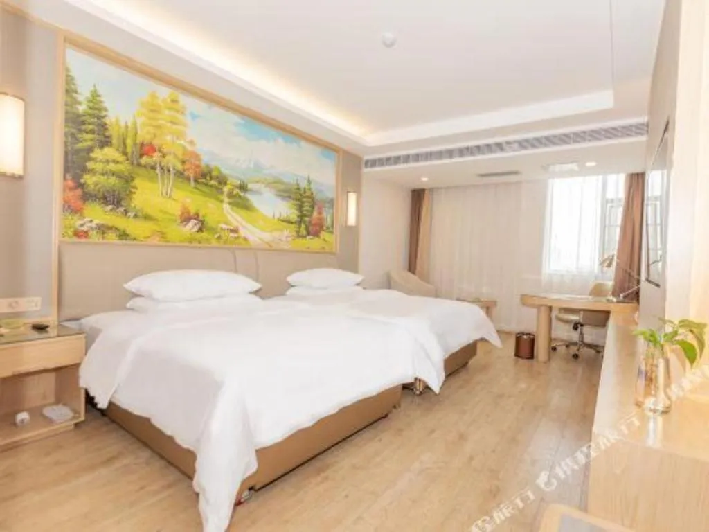 Bed in Vienna Hotel Yuxi Hongta Avenue High-Speed Railway Station