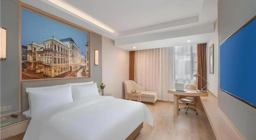 Bed in Vienna Hotel Yuxi Hongta Avenue High-Speed Railway Station