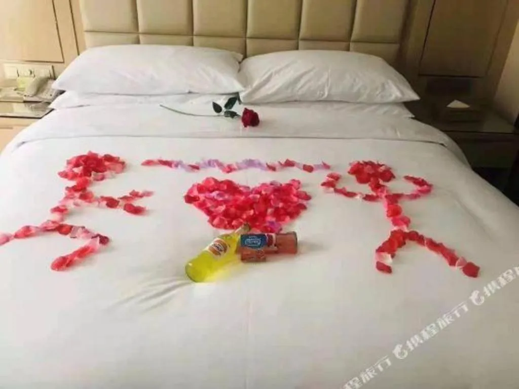 Bed in Vienna Hotel Yuxi Hongta Avenue High-Speed Railway Station