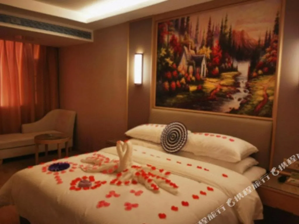 Bed in Vienna Hotel Yuxi Hongta Avenue High-Speed Railway Station