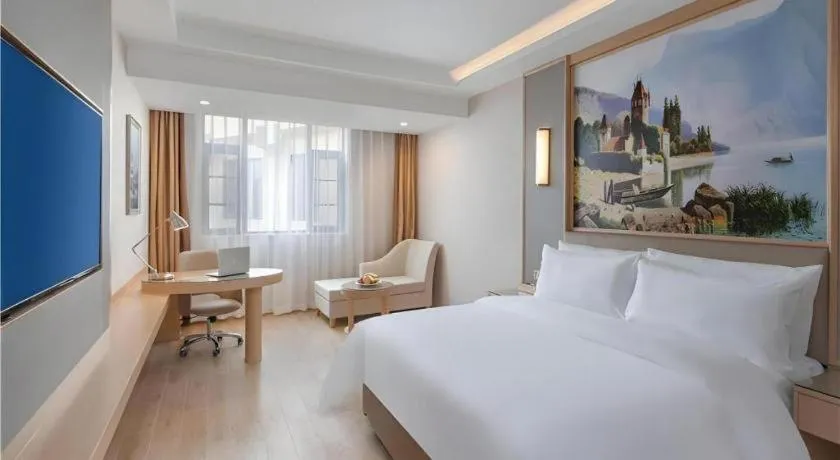 Bed in Vienna Hotel Yuxi Hongta Avenue High-Speed Railway Station