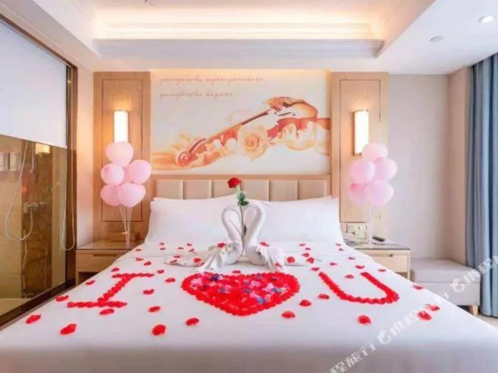 Bed in Vienna Hotel Yuxi Hongta Avenue High-Speed Railway Station